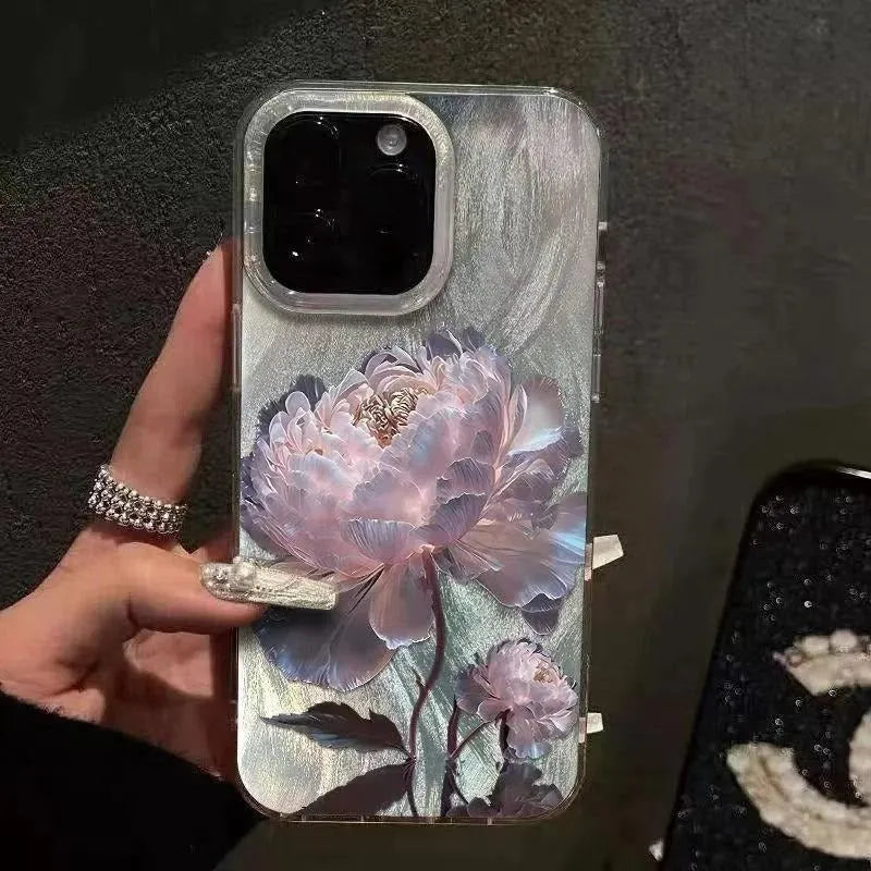 Blue Lotus light luxury hard PC phone case for Apple iPhone on a table.