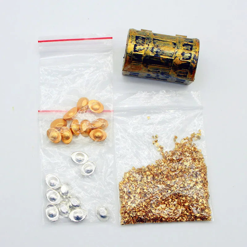 Alloy gold coin treasure box and gold bar doll house accessory set.