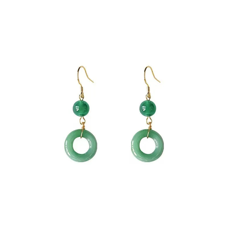 A pair of geometric peace buckle earrings with a green jade design and gold plating.