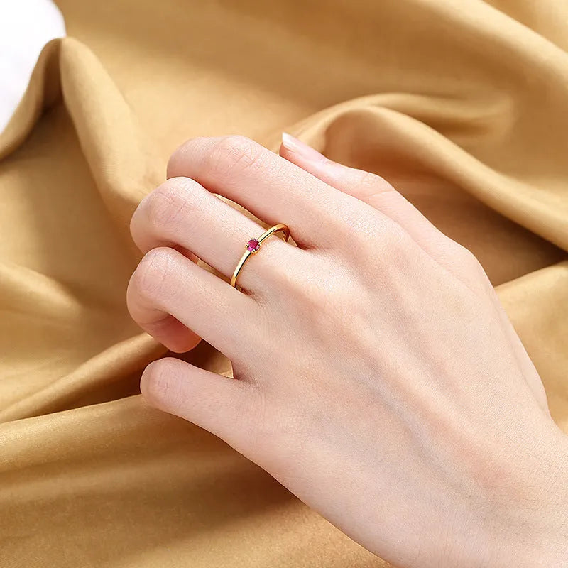 Personalised women's copper ring with a single diamond in a geometric fine circle design.
