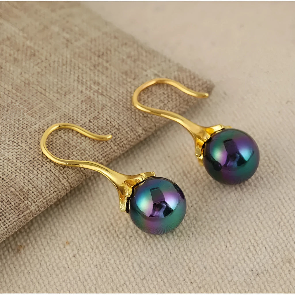 A pair of gold-colour retro-style women's earrings with an electroplated finish.