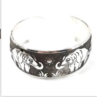 Ethnic carved open Miao silver style bracelet in alloy with Roman shape design