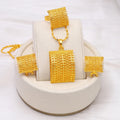Golden copper bridal jewellery set showing matching necklace, earrings and ring for wedding occasions