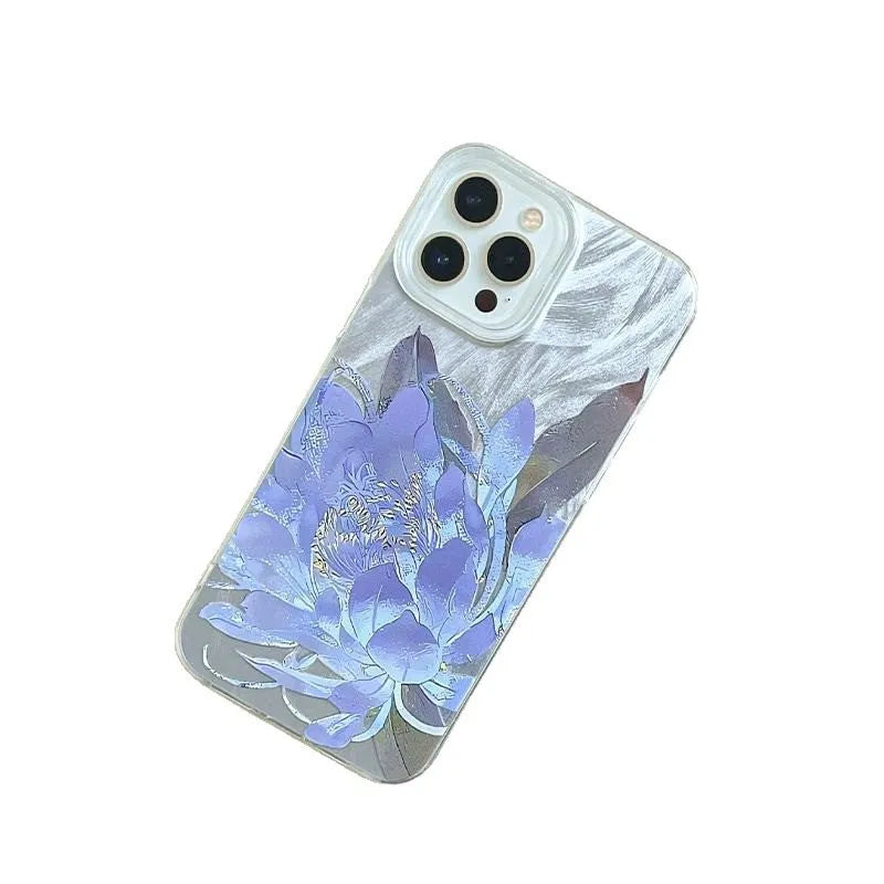 Blue Lotus light luxury hard PC phone case for Apple iPhone on a table.