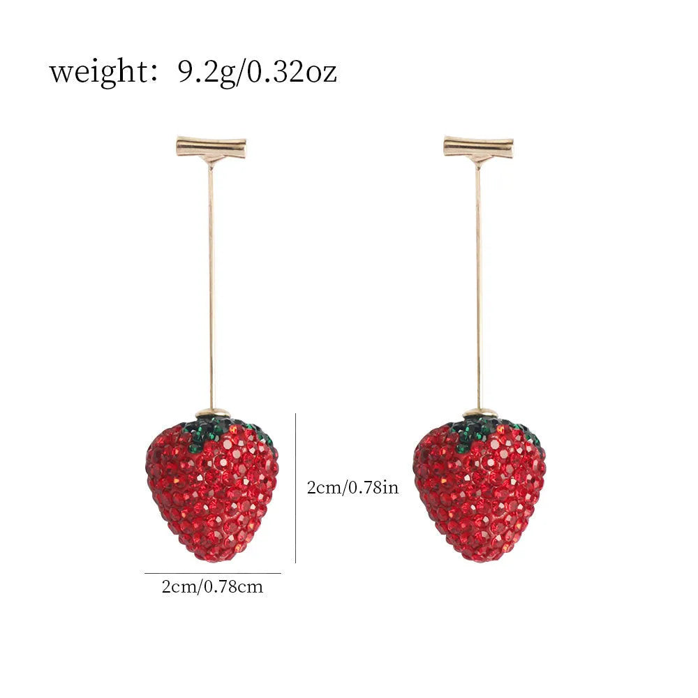 Pair of geometric strawberry stud earrings with spot drill texture in red zinc alloy, shown from front.