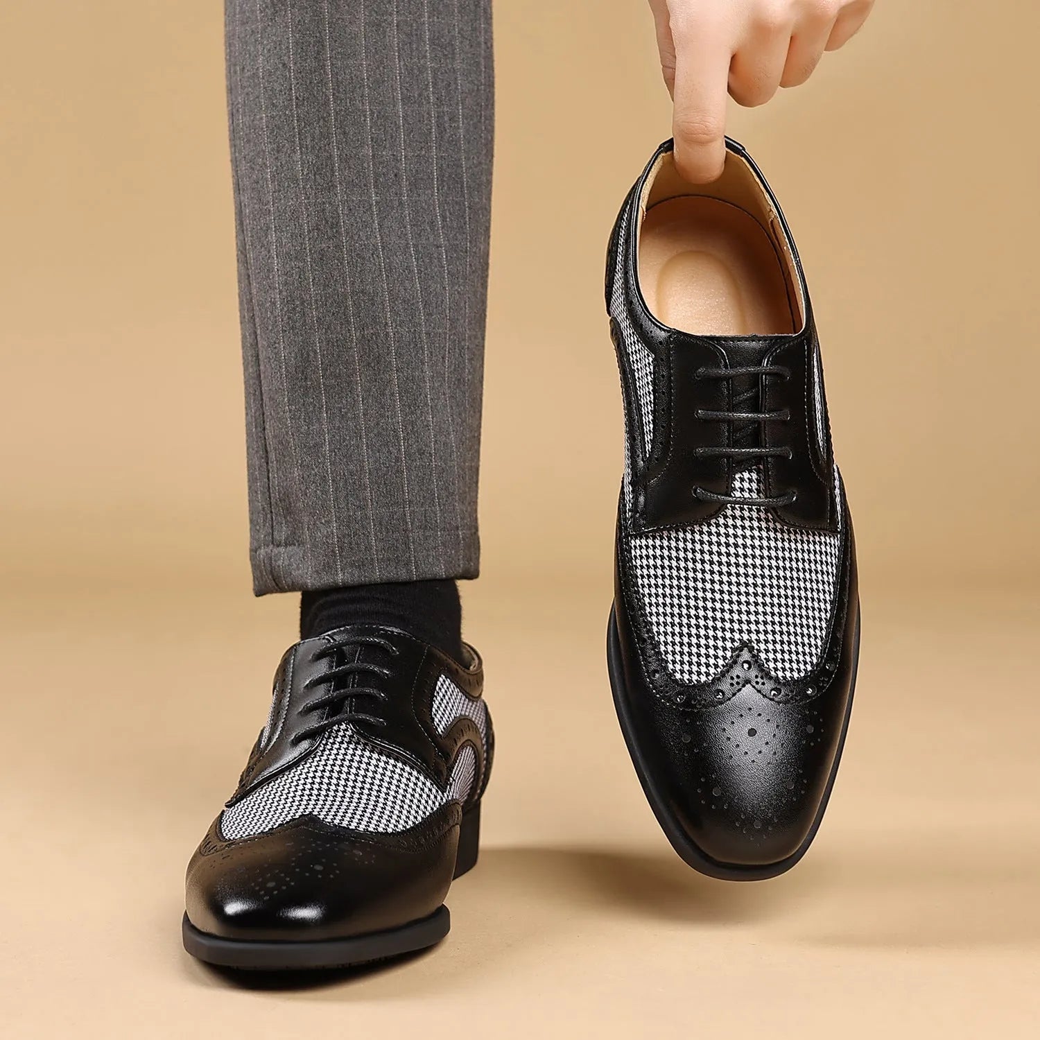Men's black houndstooth plaid casual shoes with lace-up front and rubber sole on a white background.