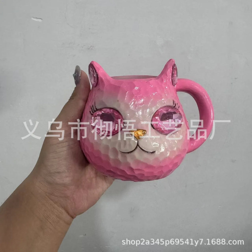 American-style cat cup resin craft ornament in purple, green, blue, and pink colours.