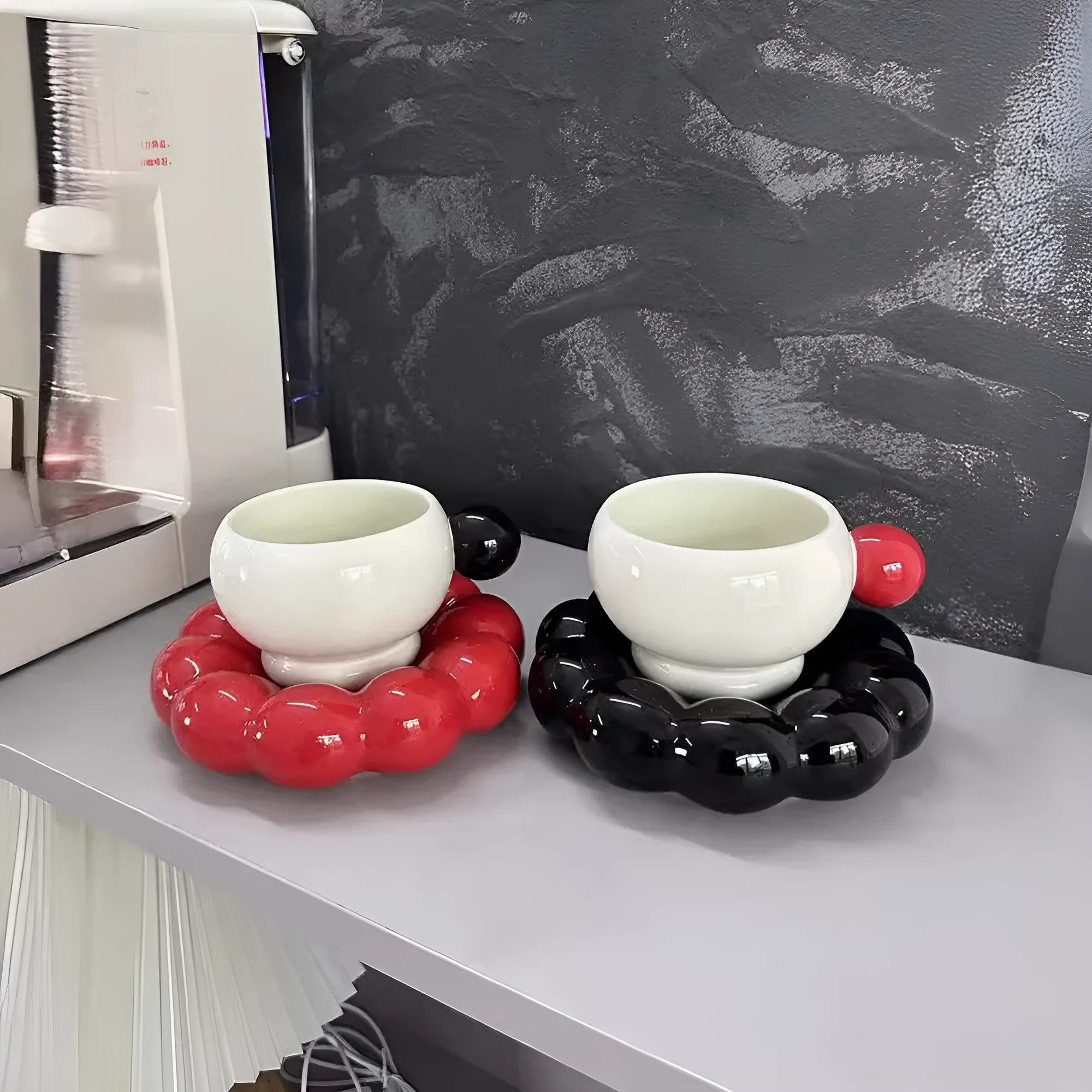 Ceramic coffee cup and saucer set in a simple Nordic style, shown in one of five colour options.