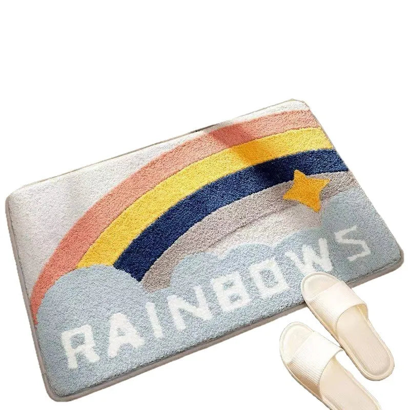 Square rainbow print floor mat with sky and sea colours on a wooden floor