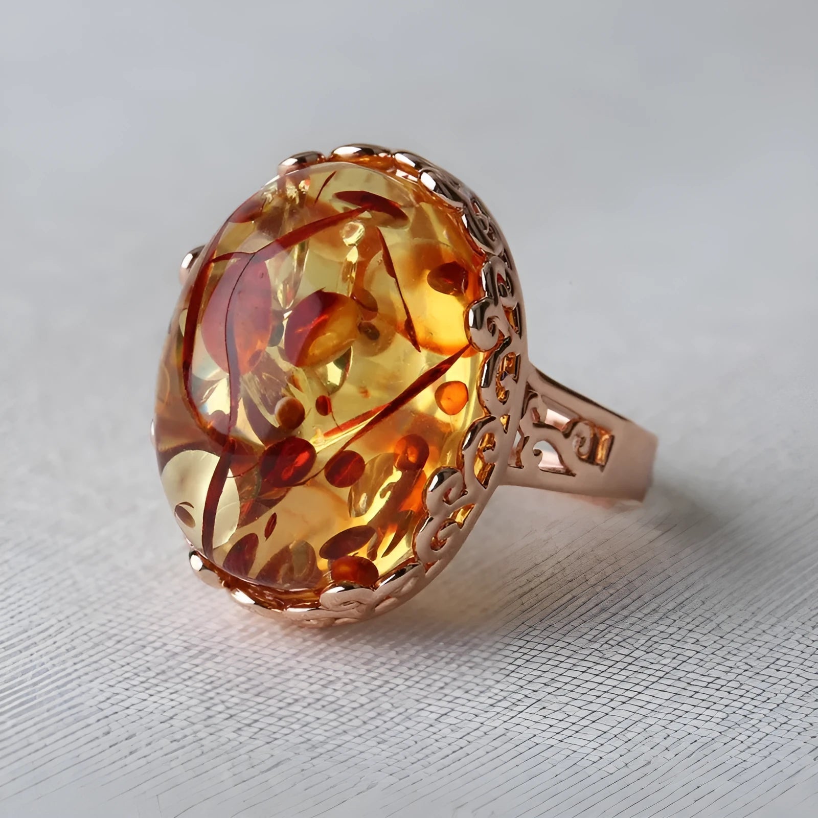 Beeswax-coloured genuine amber ring in retro ethnic style on an alloy band for men and women.
