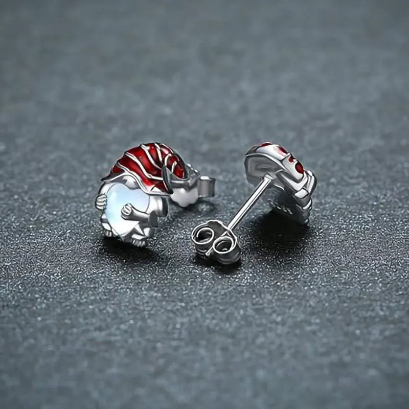 Close-up of women's heart-shaped earrings with a Santa Claus design in a white gold colour finish.