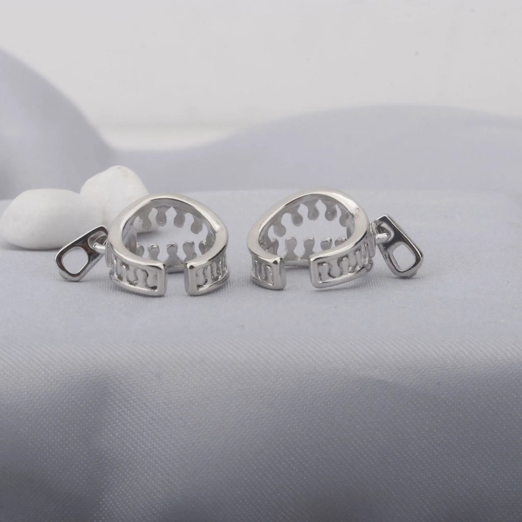 Geometric copper ear bone clip earrings with zipper clip design and line pattern details in colour ES862