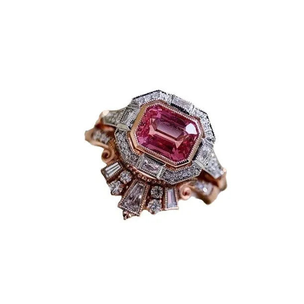 Retro style rose gold women's ring with a geometric shape and central ruby stone.