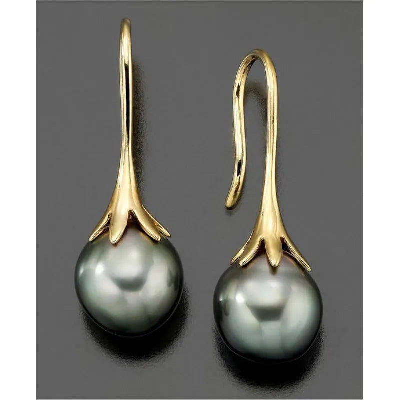 A pair of gold-colour retro-style women's earrings with an electroplated finish.