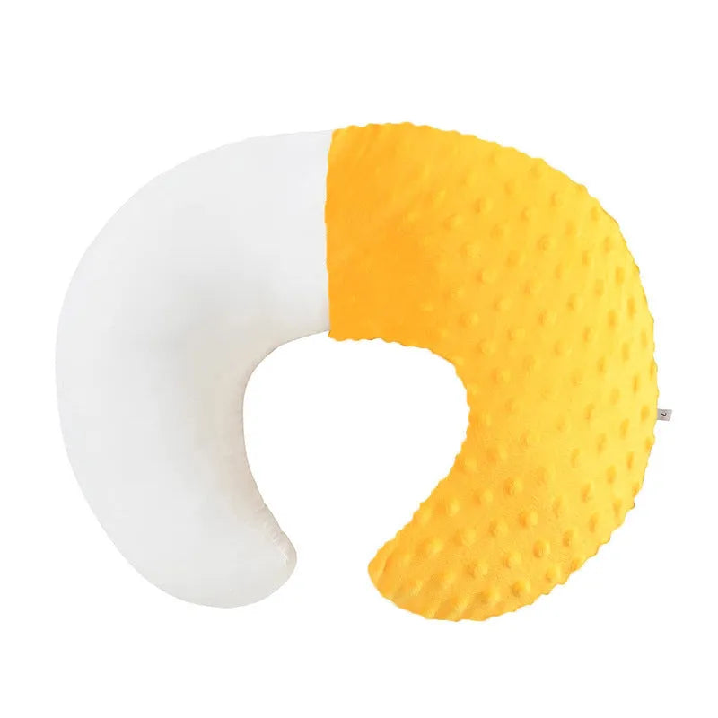 Gray U-shaped nursing pillow with removable cover on a neutral background.