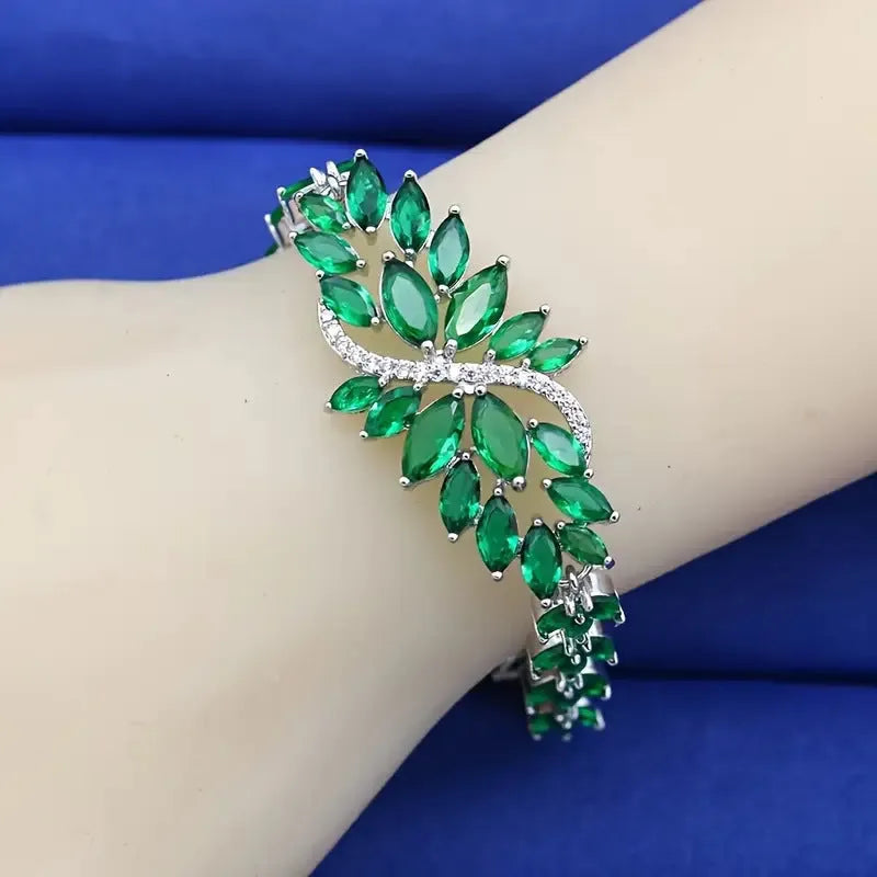 Gold electroplated copper bracelet with coloured zircon stones and ice flower design