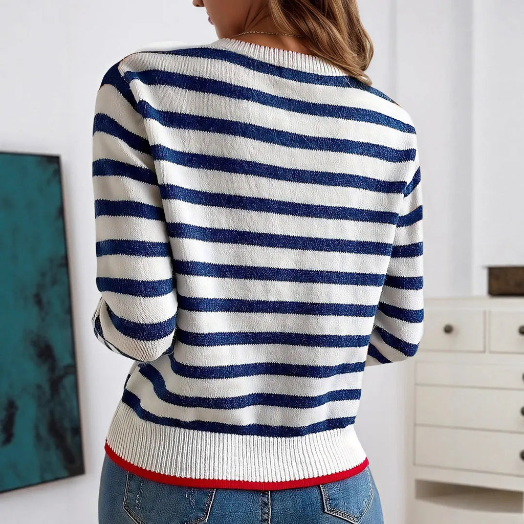 Sapphire Blue striped acrylic pullover sweater with round neck and long sleeves on hanger