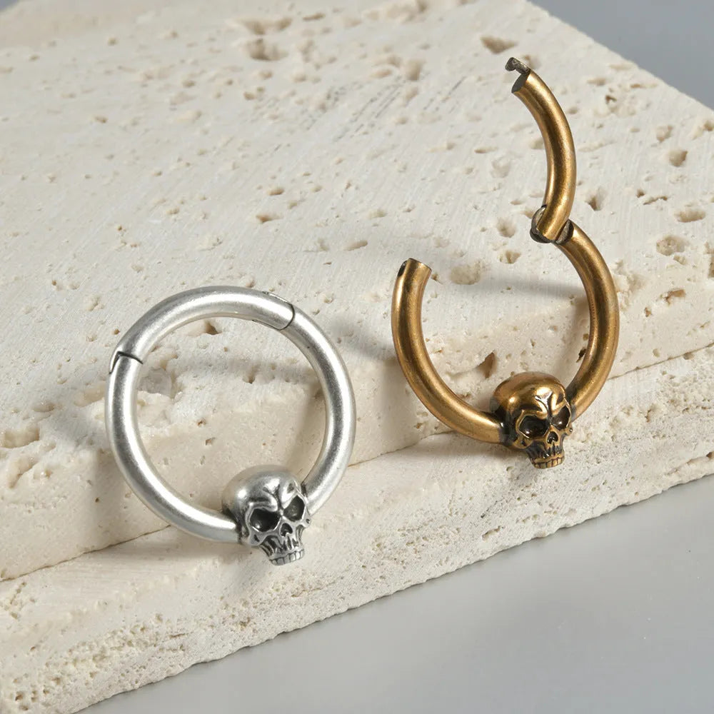 Copper ghost head punk earrings in ancient silver or gold finish with single or triple design