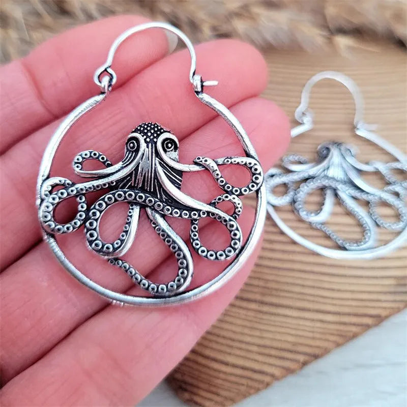 Vintage-style octopus earrings in antique silver with animal zodiac design