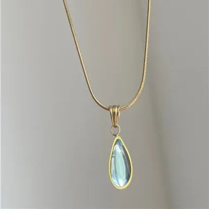 Retro blue and green water drop necklace with mixed gem inlay on a titanium steel snake bones chain.