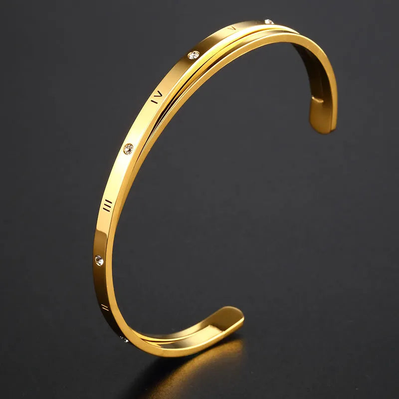 Open-ended stainless steel women's bracelet with inlaid zircon crystals in rose gold, silver, or gold tone.