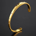 Open-ended stainless steel women's bracelet with inlaid zircon crystals in rose gold, silver, or gold tone.