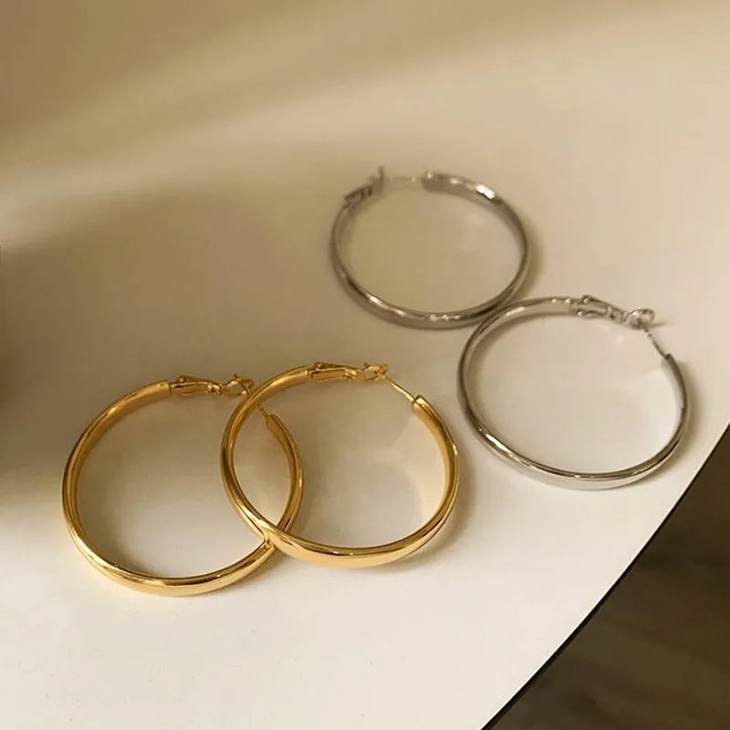 40mm circular metal earrings with gold or silver electroplated finish on copper