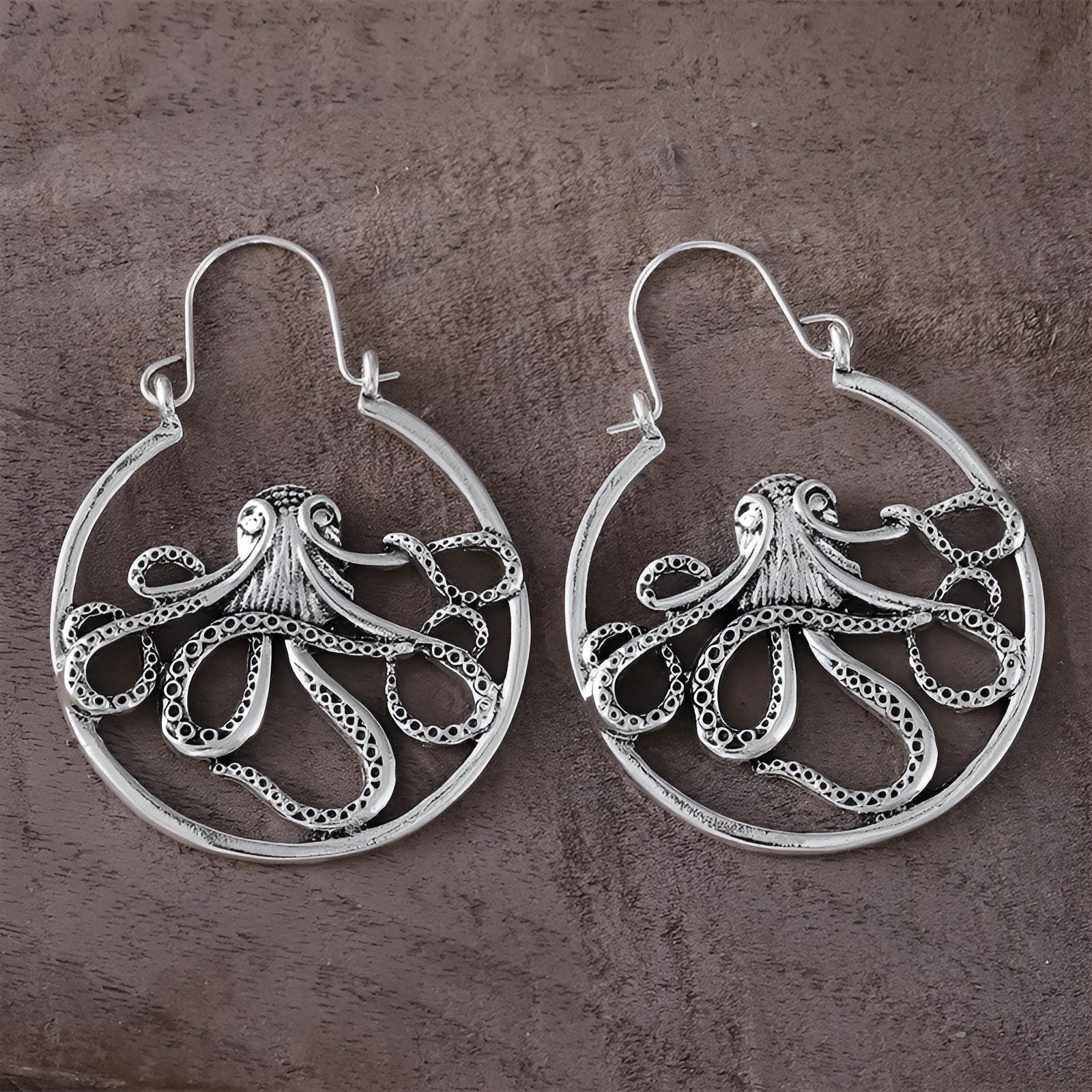 Vintage-style octopus earrings in antique silver with animal zodiac design