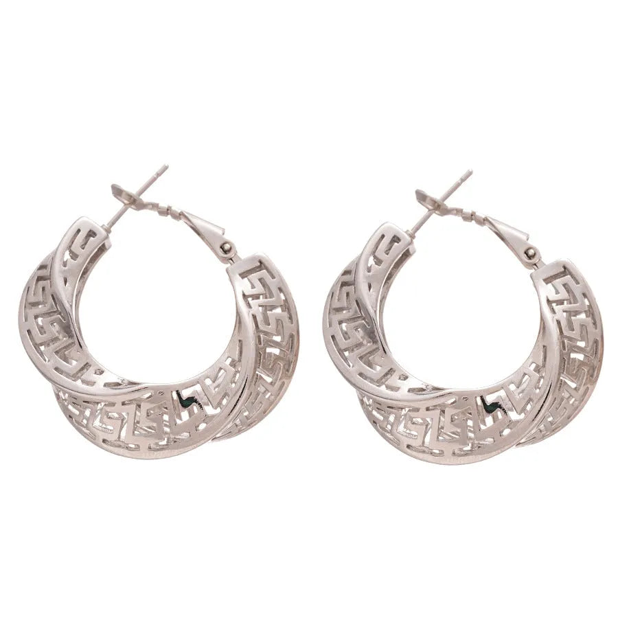 Gold and silver geometric women's hollow stud earrings with a twisted round design
