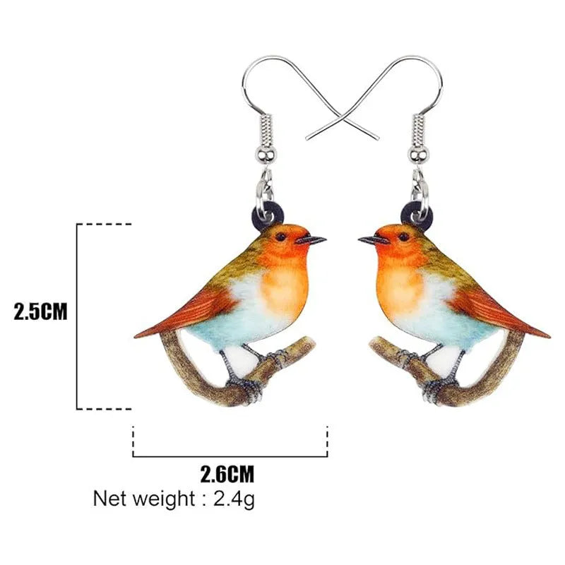 Blue Titmouse bird charm acrylic drop earrings with geometric patterns on clear pendant and silver steel posts.