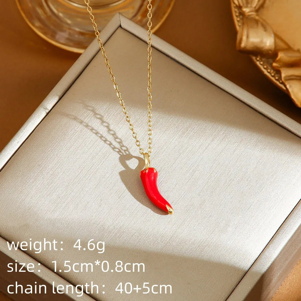 Red titanium steel necklace with a delicate alloy pendant shaped like cherries, strawberries, and peppers on an O-ring chain.