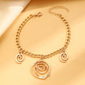 Spiral donut jewellery set showing necklace, bracelet and ear hooks with geometric circle designs in gold finish