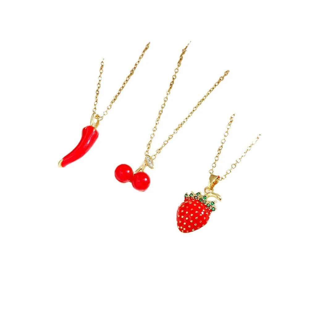 Red titanium steel necklace with a delicate alloy pendant shaped like cherries, strawberries, and peppers on an O-ring chain.