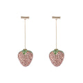 Pair of geometric strawberry stud earrings with spot drill texture in red zinc alloy, shown from front.