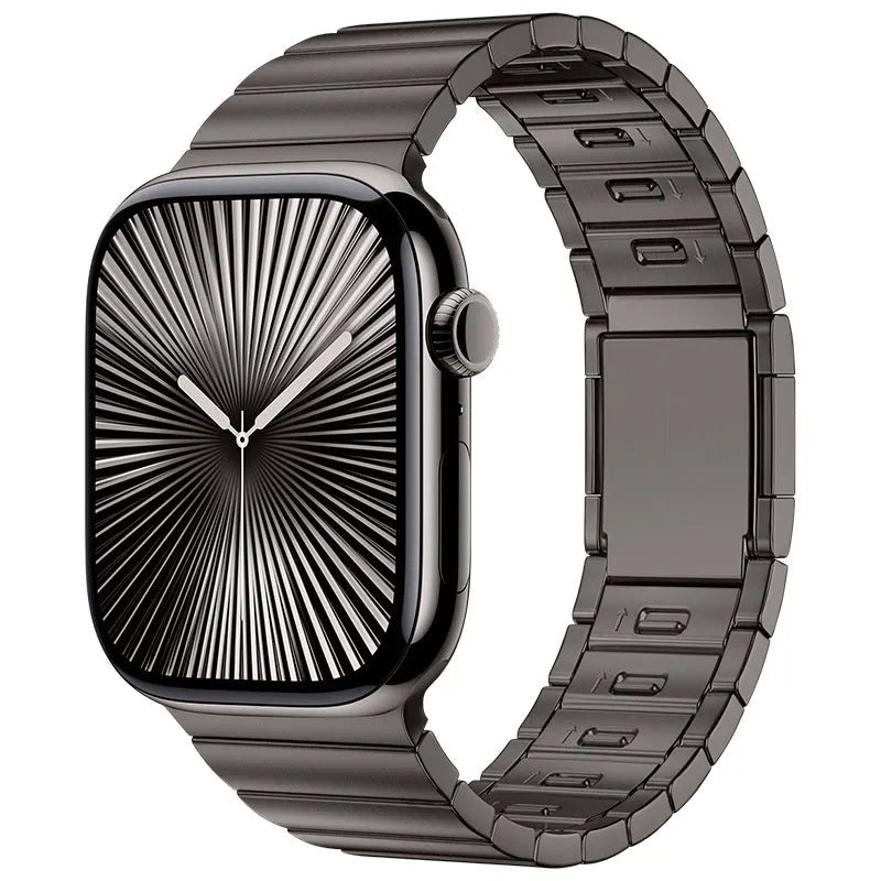 Stainless steel magnetic buckle watch strap for Apple Watch in silver colour on a grey background