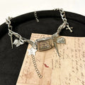 Dark women's multi-layer cross necklace with twin clavicle chains and hemp flower pattern