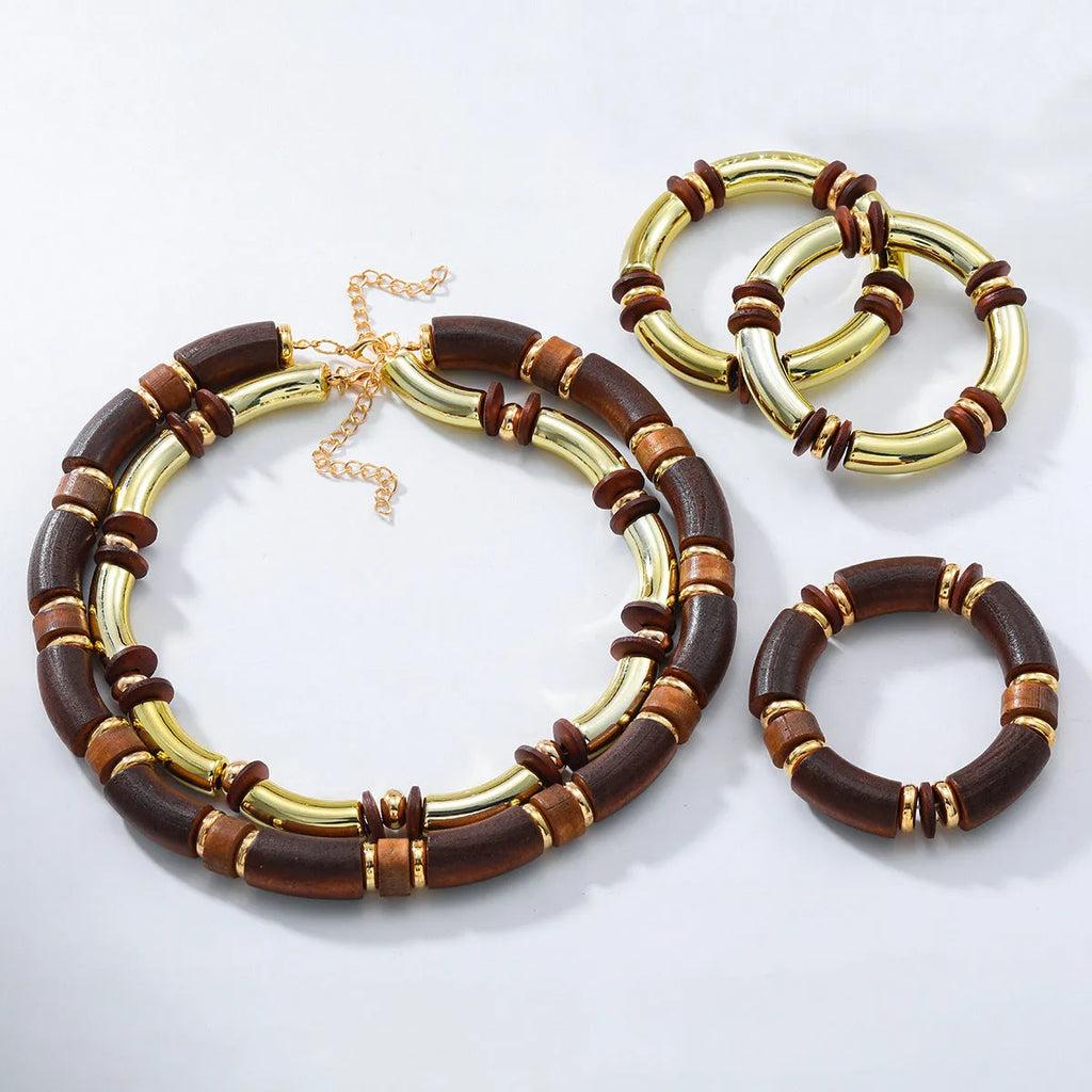 Women's multi-layer wooden necklace and bracelet set with alloy circular pendants