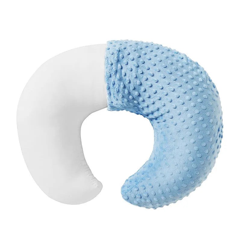 Gray U-shaped nursing pillow with removable cover on a neutral background.