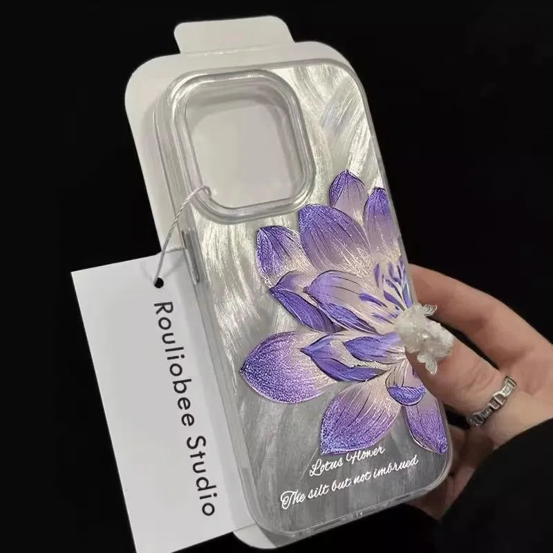 Blue Lotus light luxury hard PC phone case for Apple iPhone on a table.