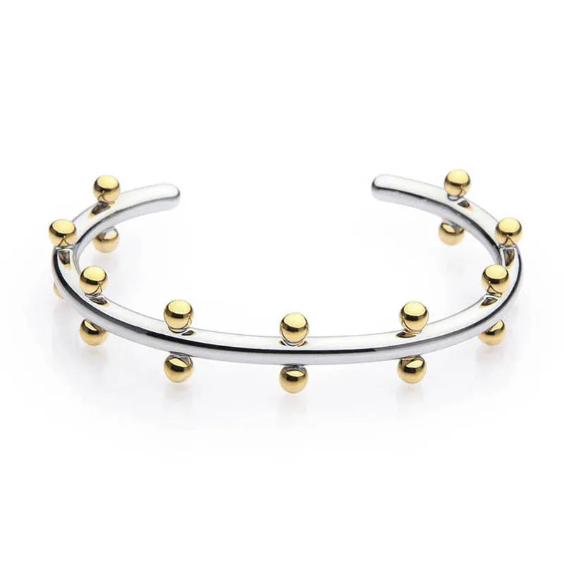 Stainless steel C-shaped bracelet with rivet-shaped bean beads in gold tone