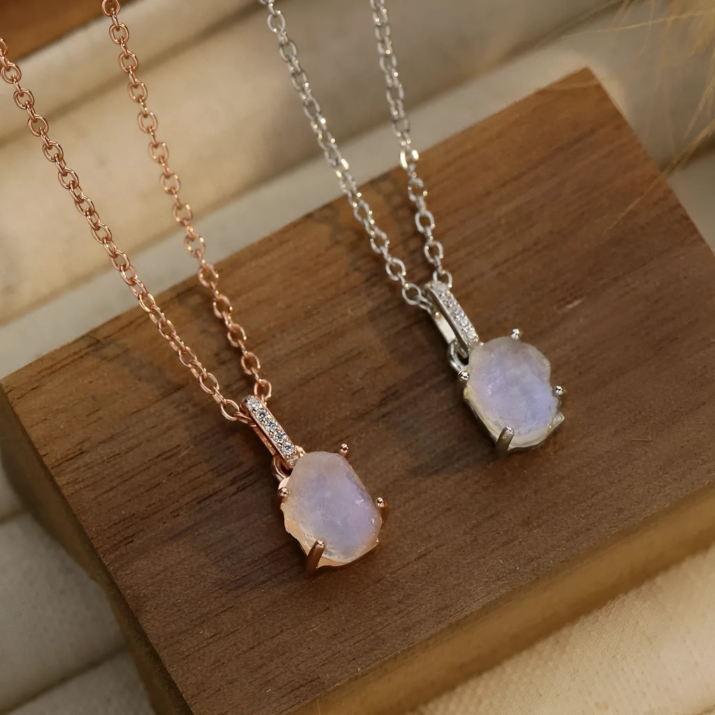 Geometric crystal moonstone pendant on sterling silver curb chain necklace