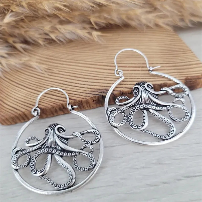Vintage-style octopus earrings in antique silver with animal zodiac design
