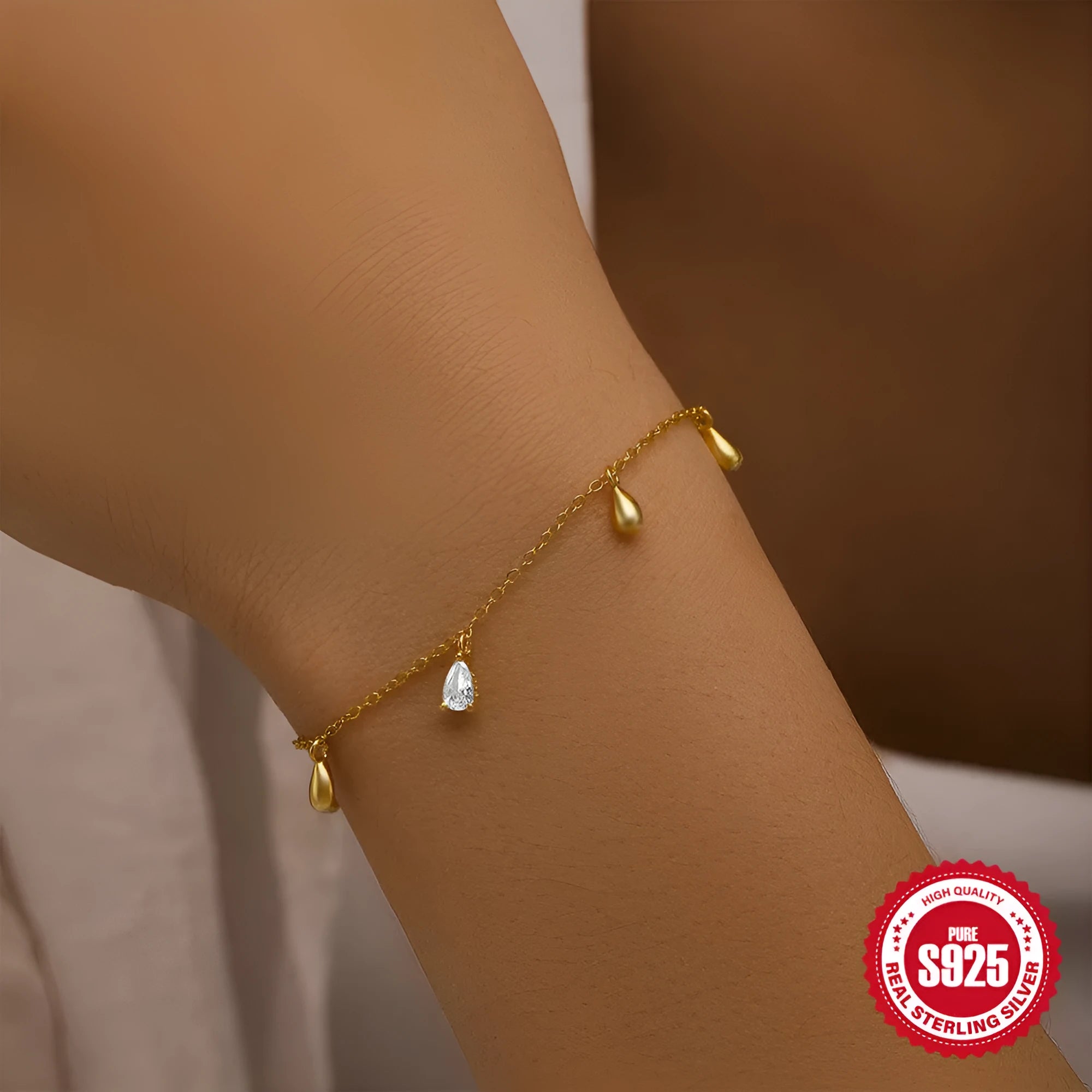 Sterling silver bracelet with gold-colour water drop diamond pendant geometric design