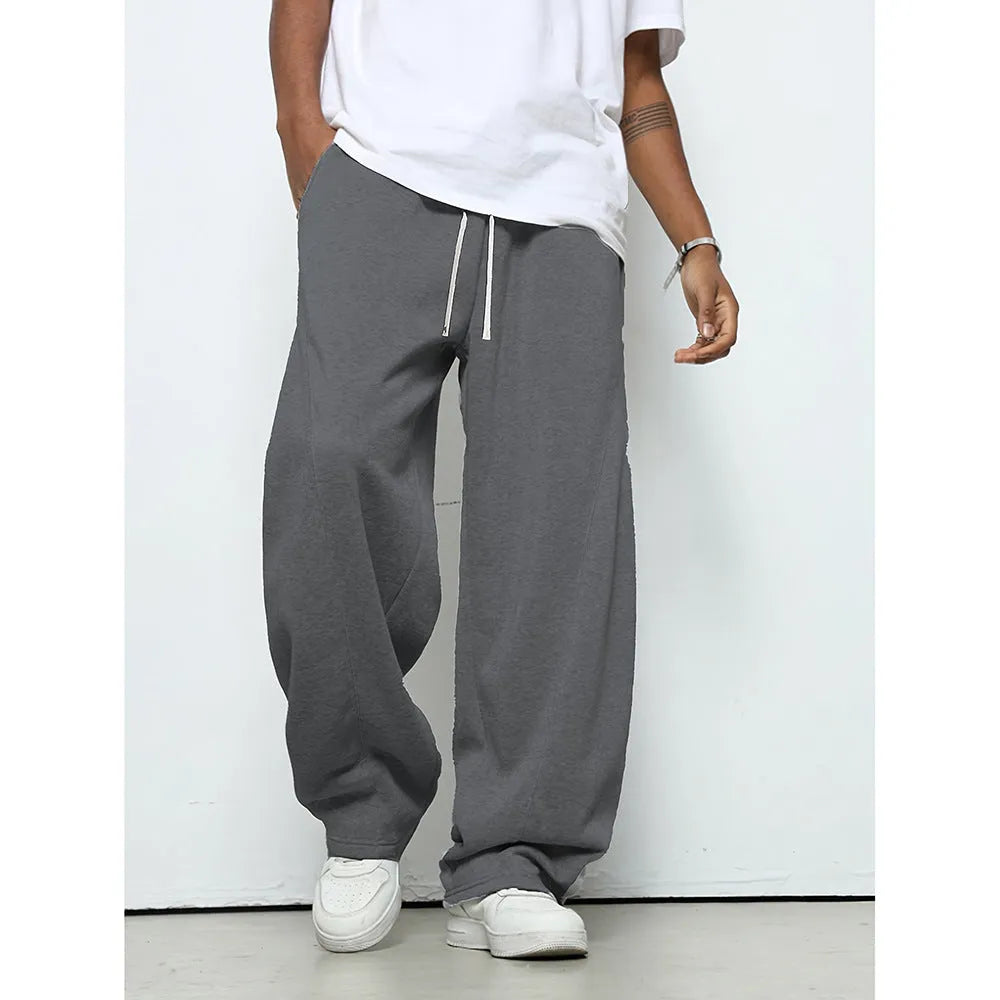 Men's straight-leg casual trousers in dark grey with a drawstring waistband.