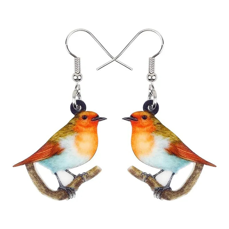 Blue Titmouse bird charm acrylic drop earrings with geometric patterns on clear pendant and silver steel posts.