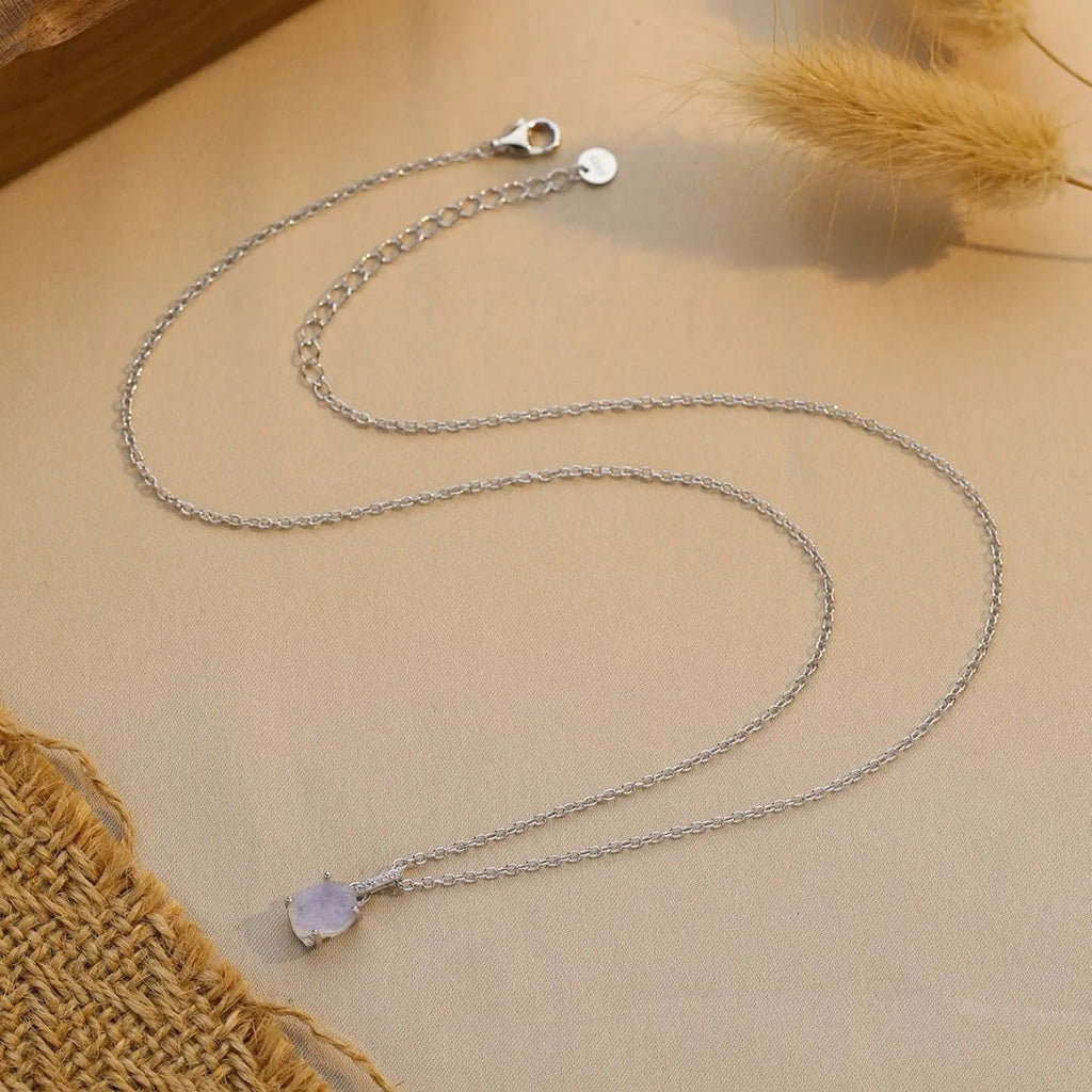 Geometric crystal moonstone pendant on sterling silver curb chain necklace