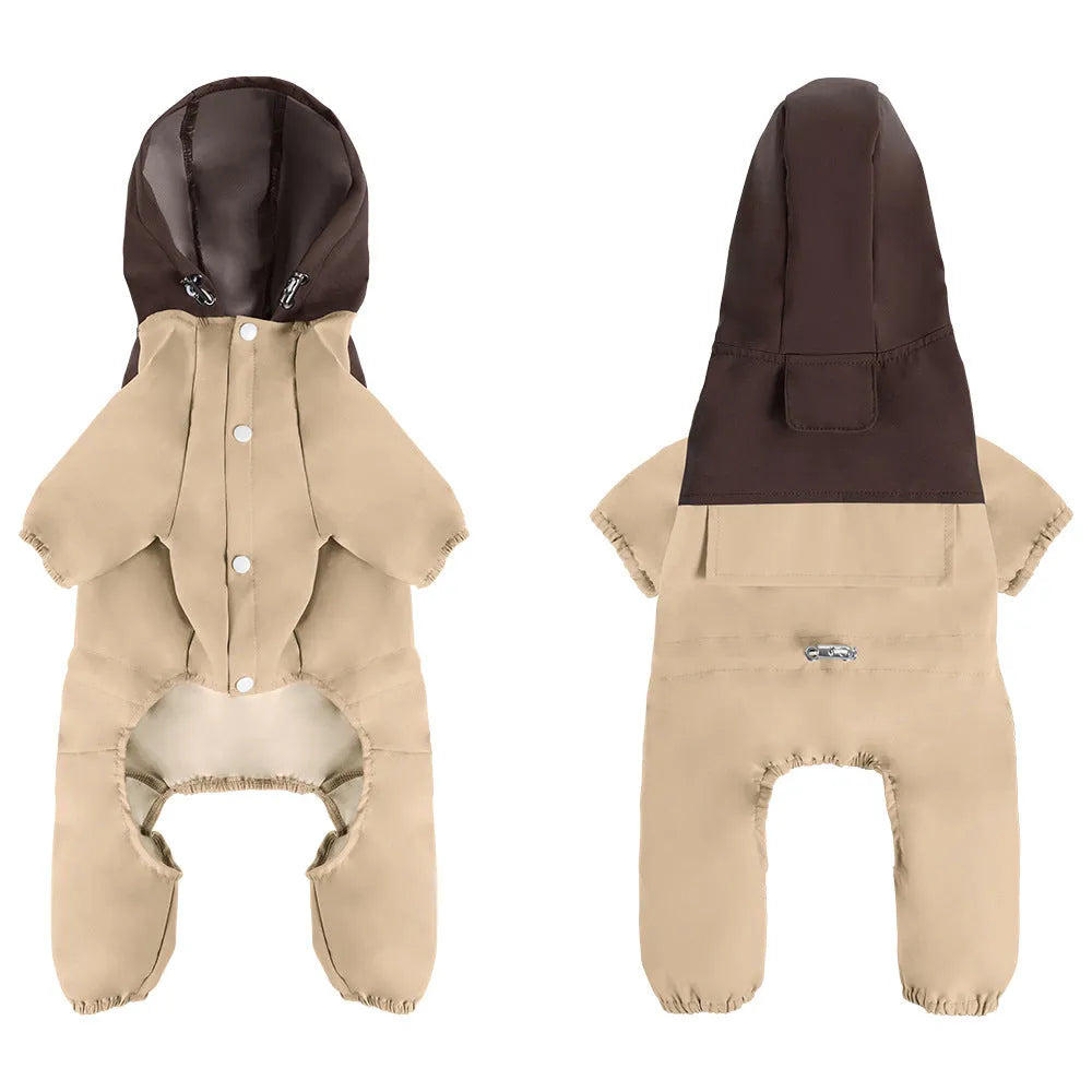 Small to medium sized dog wearing a khaki coloured waterproof polyester shell jacket.