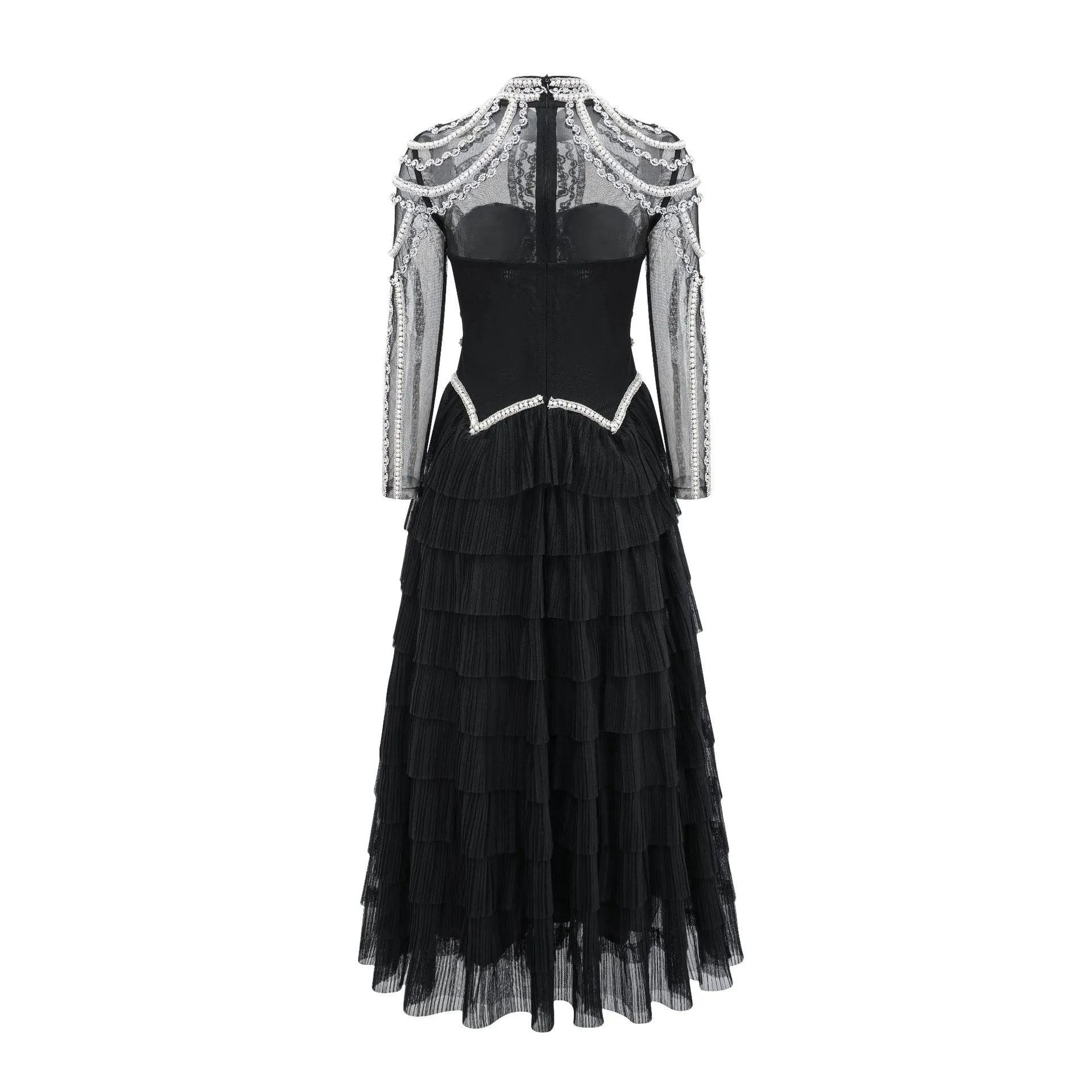 Black long sleeve women's dress with beaded decoration and a long skirt.