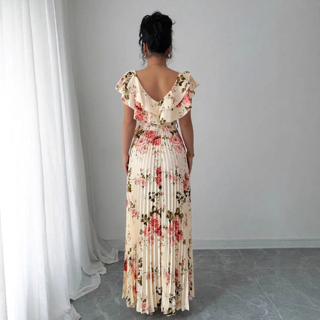 Apricot floral print V-neck dress with ruffle sleeves and a long swing skirt.