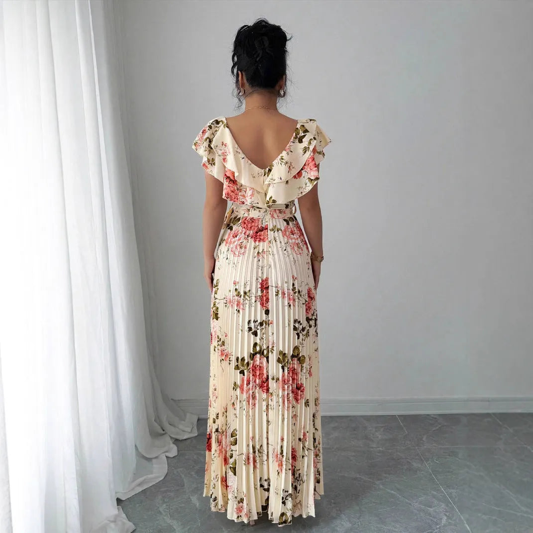 Apricot floral print V-neck dress with ruffle sleeves and a long swing skirt.